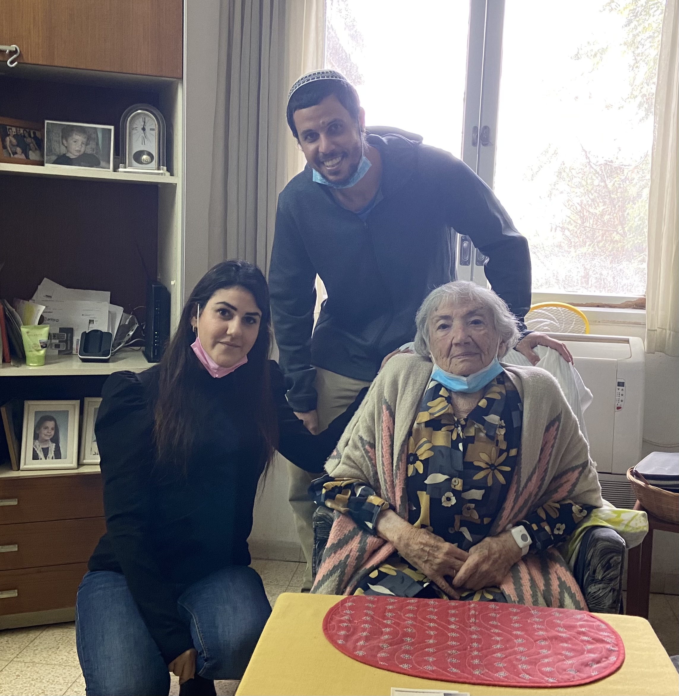 Esther Kahn at her home in Matzuva with the guides Natali and Ariel.